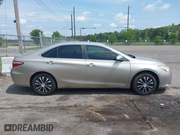 2016 Toyota Camry XLE with VIN 4T1BF1FKXGU259860, listed as a IAAI auction lot 42219507 with 239,145 mi miles and . Bid and sale history available at DreamBid. Image 13.