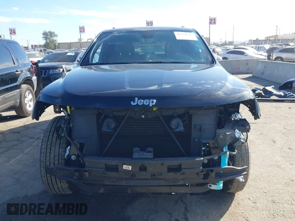2019 Jeep Grand Cherokee Altitude with VIN 1C4RJEAG7KC852263, listed as a IAAI auction lot 41590946 with 83,356 mi miles and . Bid and sale history available at DreamBid. Image 13.