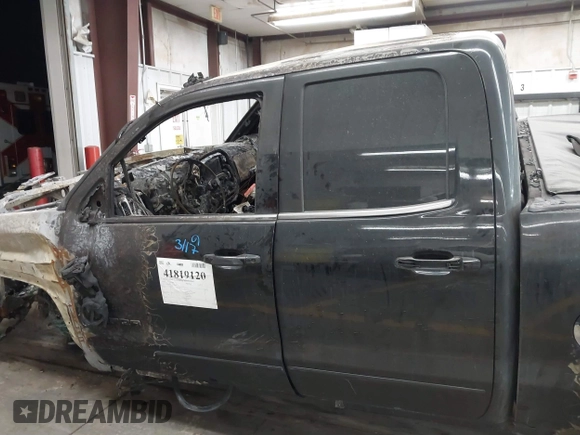2018 GMC Sierra 1500 SLE z VIN 1GTV2MEC2JZ226046, wystawiony jako IAAI lot #41819120 z przebiegiem Nie podano mil oraz . Historia ofert i sprzedaży dostępna na DreamBid. Obrazek 14.