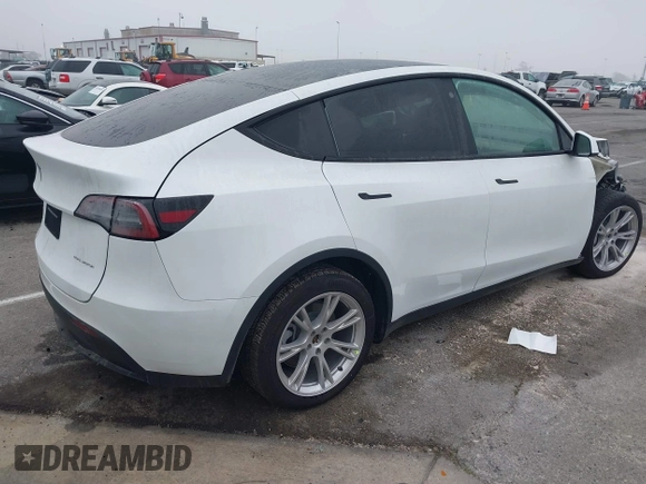2022 Tesla Model Y Long Range z VIN 7SAYGDEE4NF315356, wystawiony jako IAAI lot #41571151 z przebiegiem 1 056 mil mil oraz . Historia ofert i sprzedaży dostępna na DreamBid. Obrazek 4.