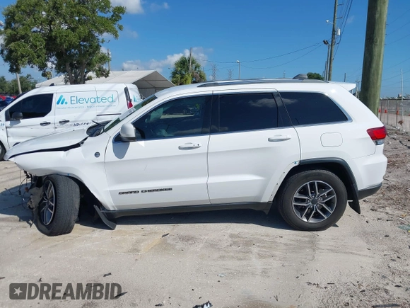 2020 Jeep Grand Cherokee Laredo with VIN 1C4RJFAG5LC258309, listed as a IAAI auction lot 42573007 with 68,980 mi miles and . Bid and sale history available at DreamBid. Image 14.