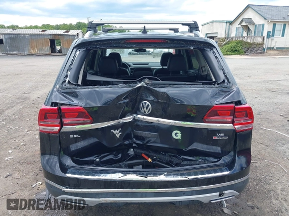 2018 Volkswagen Atlas SEL z VIN 1V2MR2CA2JC516351, wystawiony jako IAAI lot #42341113 z przebiegiem 135 077 mil mil oraz . Historia ofert i sprzedaży dostępna na DreamBid. Obrazek 6.