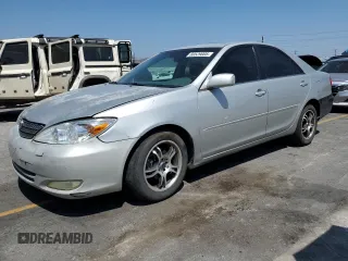 2004 Toyota Camry LE z VIN 4T1BE32K94U300544, wystawiony jako Copart lot #60529005 z przebiegiem 223 940 mil mil oraz Czysty tytuł • Clean title. Historia ofert i sprzedaży dostępna na DreamBid. Obrazek 1.