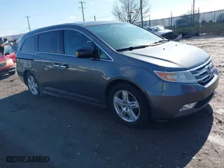 2013 Honda Odyssey Touring with VIN 5FNRL5H97DB018839, listed as a IAAI auction lot 41884016 with 171,650 mi miles. Bid and sale history available at carsss.com. Image 1.