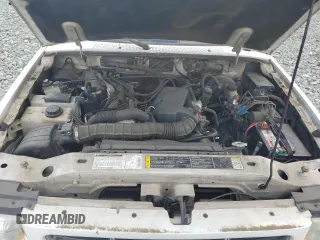 2002 Ford Ranger XL Fleet with VIN 1FTYR44U42TA55243, listed as a Copart auction lot 57310015 with 135,974 mi miles and Salvage title. Bid and sale history available at DreamBid. Image 11.
