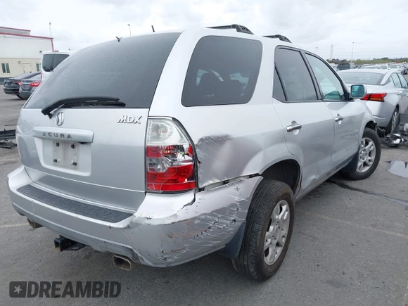 2005 Acura MDX Touring with VIN 2HNYD18955H558360, listed as a IAAI auction lot 41738503 with 153,461 mi miles. Bid and sale history available at carsss.com. Image 4.
