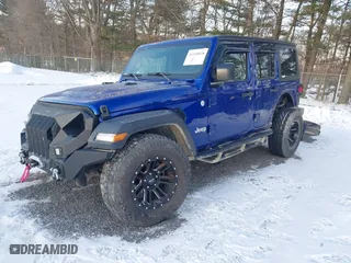 2018 Jeep Wrangler Unlimited Sport S with VIN 1C4HJXDNXJW265764, listed as a IAAI auction lot 41359018 with 50,941 mi miles. Bid and sale history available at carsss.com. Image 19.