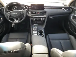 2023 Genesis G70 2.0T with VIN KMTG34TA4PU129199, listed as a Copart auction lot 80963124 with 15,729 mi miles and Salvage Title. Bid and sale history available at carsss.com. Image 8.