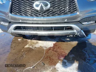 2018 Infiniti QX30 Premium z VIN SJKCH5CR7JA047290, wystawiony jako IAAI lot #41270760 z przebiegiem 72 169 mil mil oraz . Historia ofert i sprzedaży dostępna na DreamBid. Obrazek 6.