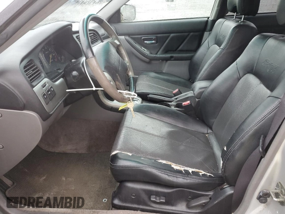 2003 Subaru Baja z VIN 4S4BT61C637102860, wystawiony jako Copart lot #49914785 z przebiegiem 256 493 mil mil oraz Szkoda całkowita • Salvage title. Historia ofert i sprzedaży dostępna na DreamBid. Obrazek 7.