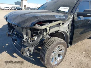 2022 Ram 1500 Big Horn with VIN 1C6RREBT3NN442466, listed as a IAAI auction lot 40734114 with 22,586 mi miles and . Bid and sale history available at DreamBid. Image 6.