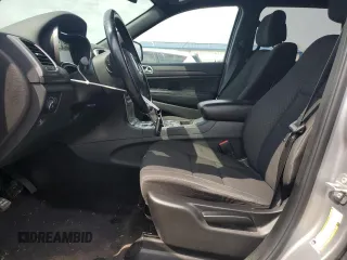2018 Jeep Grand Cherokee Laredo E with VIN 1C4RJFAG0JC351090, listed as a Copart auction lot 52958635 with 96,956 mi miles and Salvage Title. Bid and sale history available at DreamBid. Image 7.