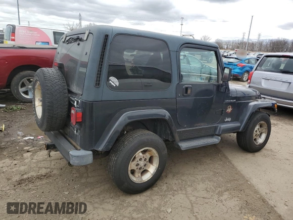 2002 Jeep Wrangler Sahara z VIN 1J4FA59S42P776905, wystawiony jako Copart lot #53373015 z przebiegiem 231 915 mil mil oraz Czysty tytuł • Clean title. Historia ofert i sprzedaży dostępna na DreamBid. Obrazek 3.