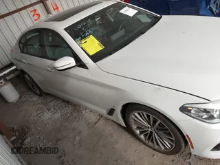2018 BMW 5 Series 530e with VIN WBAJA9C57JB034128, listed as a IAAI auction lot 41800329 with 66,684 mi miles and . Bid and sale history available at DreamBid. Image 1.