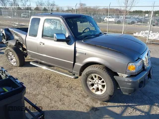 2011 Ford Ranger XLT with VIN 1FTLR4FEXBPB08276, listed as a IAAI auction lot 41559735 with 214,383 mi miles. Bid and sale history available at carsss.com. Image 1.