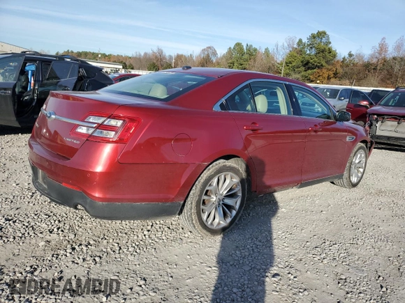 2014 Ford Taurus Limited with VIN 1FAHP2F81EG183128, listed as a Copart auction lot 82409384 with 107,624 mi miles and Salvage title. Bid and sale history available at DreamBid. Image 3.