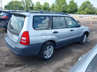 2004 Subaru Forester X with VIN JF1SG63664H736980, listed as a IAAI auction lot 42666843 with 154,405 mi miles and . Bid and sale history available at DreamBid. Image 4.