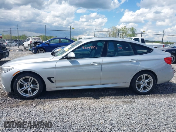 2014 BMW 3 Series 328i Gran Turismo xDrive z VIN WBA3X5C51ED556554, wystawiony jako IAAI lot #42149391 z przebiegiem 189 624 mil mil oraz . Historia ofert i sprzedaży dostępna na DreamBid. Obrazek 14.