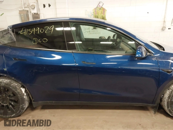 2021 Tesla Model Y Long Range with VIN 5YJYGDEE2MF185945, listed as a IAAI auction lot 41599029 with 53,815 mi miles and . Bid and sale history available at DreamBid. Image 14.