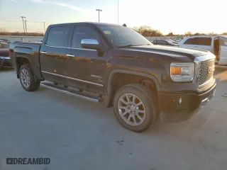 2014 GMC Sierra 1500 Denali with VIN 3GTU2WEJ1EG507220, listed as a Copart auction lot 87714265 with 143,161 mi miles and Salvage Title. Bid and sale history available at carsss.com. Image 4.
