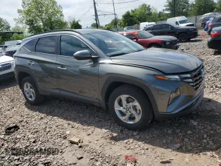 2023 Hyundai Tucson SEL z VIN 5NMJBCAE1PH272772, wystawiony jako Copart lot #56799805 z przebiegiem 20 041 mil mil oraz Szkoda całkowita • Salvage title. Historia ofert i sprzedaży dostępna na DreamBid. Obrazek 4.