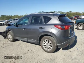 2014 Mazda CX-5 Touring with VIN JM3KE4CY0E0421878, listed as a Copart auction lot 49475805 with 138,074 mi miles and Salvage Title. Bid and sale history available at carsss.com. Image 2.