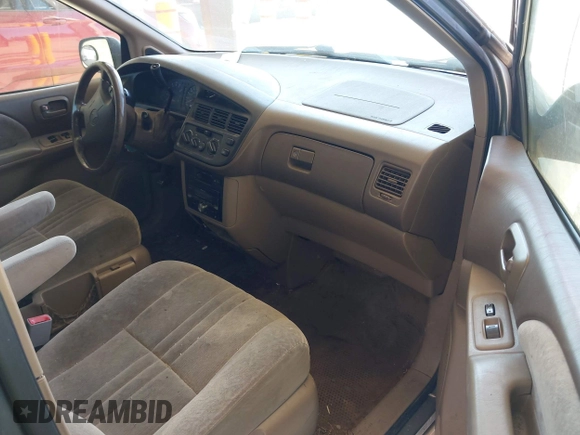 1999 Toyota Sienna LE with VIN 4T3ZF13C4XU166786, listed as a IAAI auction lot 42057995 with 316,259 mi miles. Bid and sale history available at carsss.com. Image 5.