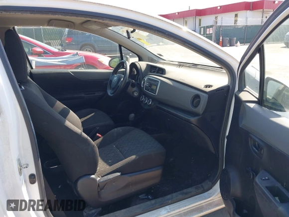 2014 Toyota Yaris L with VIN VNKJTUD35EA011933, listed as a IAAI auction lot 42150303 with 114,369 mi miles. Bid and sale history available at carsss.com. Image 5.
