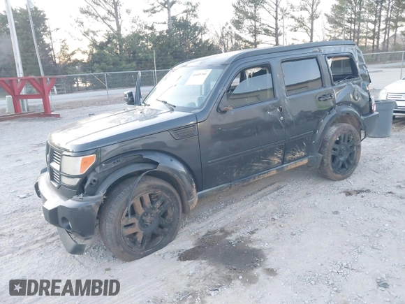 2010 Dodge Nitro SE with VIN 1D4PT2GK3AW137797, listed as a IAAI auction lot 41689701 with 182,452 mi miles. Bid and sale history available at carsss.com. Image 2.