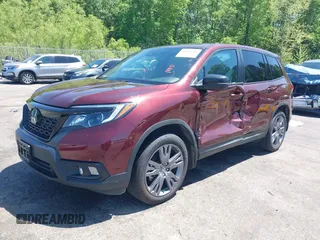 2019 Honda Passport EX-L with VIN 5FNYF7H59KB009956, listed as a IAAI auction lot 42021317 with 58,121 mi miles and . Bid and sale history available at DreamBid. Image 2.