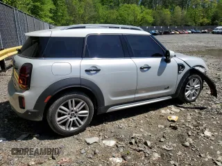 2023 MINI Countryman Cooper S with VIN WMZ83BR0XP3P91056, listed as a Copart auction lot 54699605 with 22,049 mi miles and Salvage title. Bid and sale history available at DreamBid. Image 3.