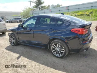 2016 BMW X4 xDrive28i with VIN 5UXXW3C55G0R22374, listed as a Copart auction lot 52823304 with 72,382 mi miles. Bid and sale history available at carsss.com. Image 2.