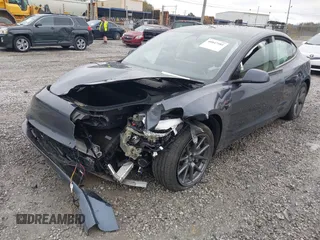 2022 Tesla Model 3 Long Range with VIN 5YJ3E1EB3NF352741, listed as a IAAI auction lot 40847981 with Not Provided miles and . Bid and sale history available at DreamBid. Image 6.