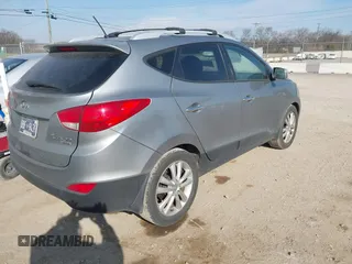 2013 Hyundai Tucson GLS with VIN KM8JU3AC0DU572232, listed as a IAAI auction lot 41724332 with 232,661 mi miles. Bid and sale history available at carsss.com. Image 4.