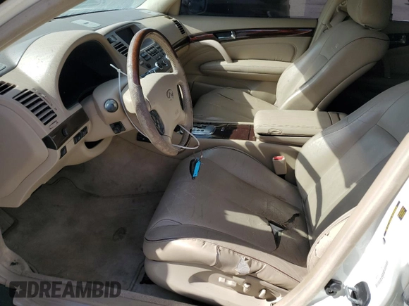 2005 Infiniti Q45 z VIN JNKBF01A85M100070, wystawiony jako Copart lot #82127494 z przebiegiem 176 578 mil mil oraz Szkoda całkowita • Salvage title. Historia ofert i sprzedaży dostępna na DreamBid. Obrazek 7.