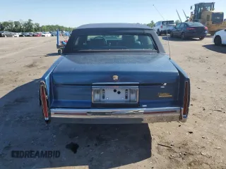 1992 Cadillac DeVille z VIN 1G6CD53B8N4294424, wystawiony jako Copart lot #56492064 z przebiegiem 151 165 mil mil oraz Szkoda całkowita • Salvage title. Historia ofert i sprzedaży dostępna na DreamBid. Obrazek 6.