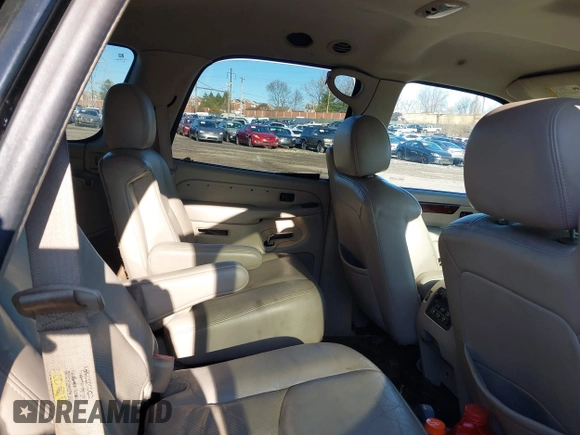 2005 Cadillac Escalade with VIN 1GYEC63T95R123072, listed as a IAAI auction lot 41861375 with 211,825 mi miles and . Bid and sale history available at DreamBid. Image 8.