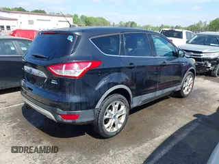 2013 Ford Escape SEL with VIN 1FMCU9H94DUA10002, listed as a IAAI auction lot 41963247 with 85,941 mi miles. Bid and sale history available at carsss.com. Image 4.