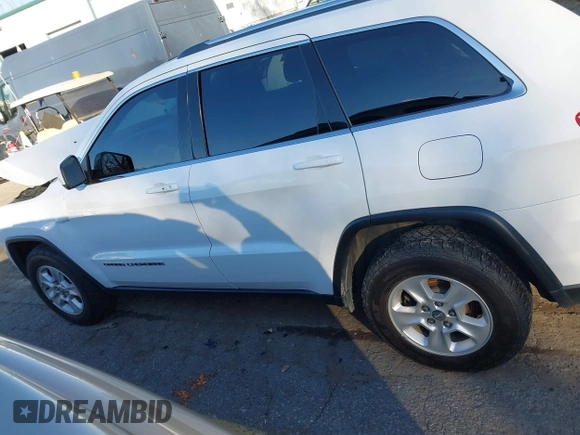 2017 Jeep Grand Cherokee Laredo with VIN 1C4RJFAGXHC756562, listed as a IAAI auction lot 40793476 with 102,241 mi miles and . Bid and sale history available at DreamBid. Image 14.