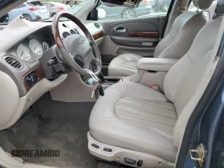 2001 Chrysler LHS z VIN 2C3AC56G61H589389, wystawiony jako Copart lot #58993363 z przebiegiem 175 064 mil mil oraz Szkody całkowita. Historia ofert i sprzedaży dostępna na DreamBid. Obrazek 7.