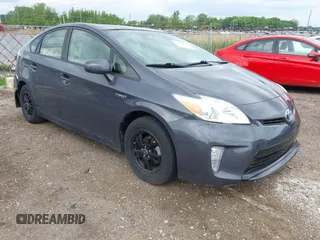 2015 Toyota Prius Four z VIN JTDKN3DU5F1934117, wystawiony jako IAAI lot #42370807 z przebiegiem 67 806 mil mil oraz . Historia ofert i sprzedaży dostępna na DreamBid. Obrazek 1.