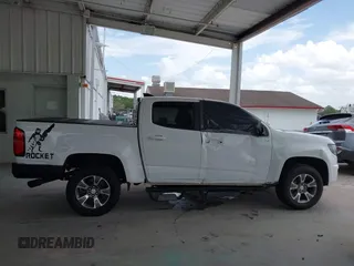 2020 Chevrolet Colorado 2WD Z71 with VIN 1GCGSDEN2L1159458, listed as a IAAI auction lot 42412924 with 90,011 mi miles and . Bid and sale history available at DreamBid. Image 14.