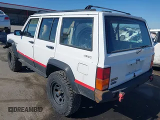 1995 Jeep Cherokee Sport with VIN 1J4FJ68S1SL576255, listed as a IAAI auction lot 42178902 with 214,041 mi miles and . Bid and sale history available at DreamBid. Image 3.