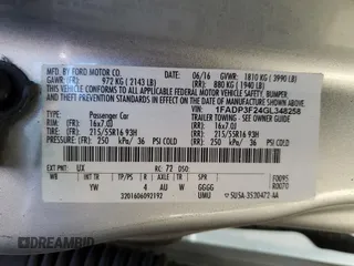 2016 Ford Focus SE with VIN 1FADP3F24GL348258, listed as a Copart auction lot 47851945 with 111,200 mi miles and Salvage Title. Bid and sale history available at DreamBid. Image 12.