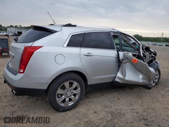 2015 Cadillac SRX Luxury Collection z VIN 3GYFNEE31FS618855, wystawiony jako Copart lot #54868505 z przebiegiem 111 612 mil mil oraz Szkoda całkowita • Salvage title. Historia ofert i sprzedaży dostępna na DreamBid. Obrazek 3.
