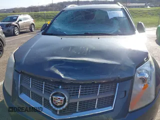 2011 Cadillac SRX Performance Collection with VIN 3GYFNBEYXBS527765, listed as a IAAI auction lot 41904013 with 168,318 mi miles and . Bid and sale history available at carsss.com. Image 6.