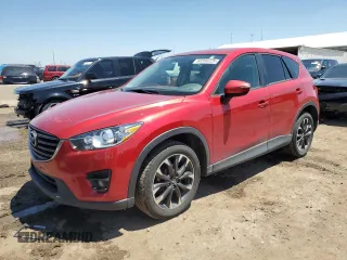 2016 Mazda CX-5 Grand Touring z VIN JM3KE4DY7G0871187, wystawiony jako Copart lot #60200225 z przebiegiem 110 047 mil mil oraz Szkoda całkowita • Salvage title. Historia ofert i sprzedaży dostępna na DreamBid. Obrazek 1.