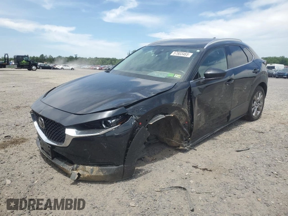 2022 Mazda CX-30 S Premium with VIN 3MVDMBDL2NM428998, listed as a Copart auction lot 57803465 with 49,090 mi miles and Salvage title. Bid and sale history available at DreamBid. Image 1.