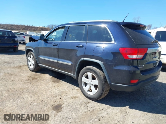 2011 Jeep Grand Cherokee Laredo with VIN 1J4RR4GG3BC670712, listed as a IAAI auction lot 41738127 with 93,714 mi miles and . Bid and sale history available at DreamBid. Image 3.