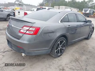2014 Ford Taurus SHO with VIN 1FAHP2KT0EG171336, listed as a IAAI auction lot 41566688 with 154,328 mi miles. Bid and sale history available at carsss.com. Image 4.